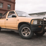 A pickup truck sitting in a parking lot